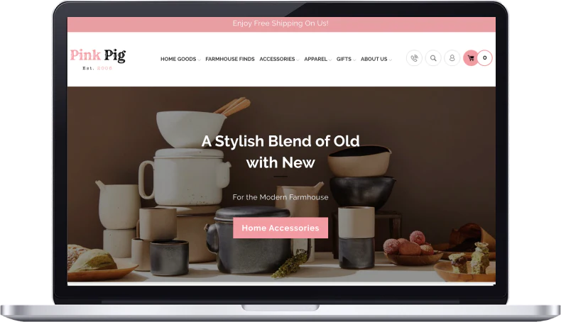 Pink Pig website above the fold screenshot on a laptop